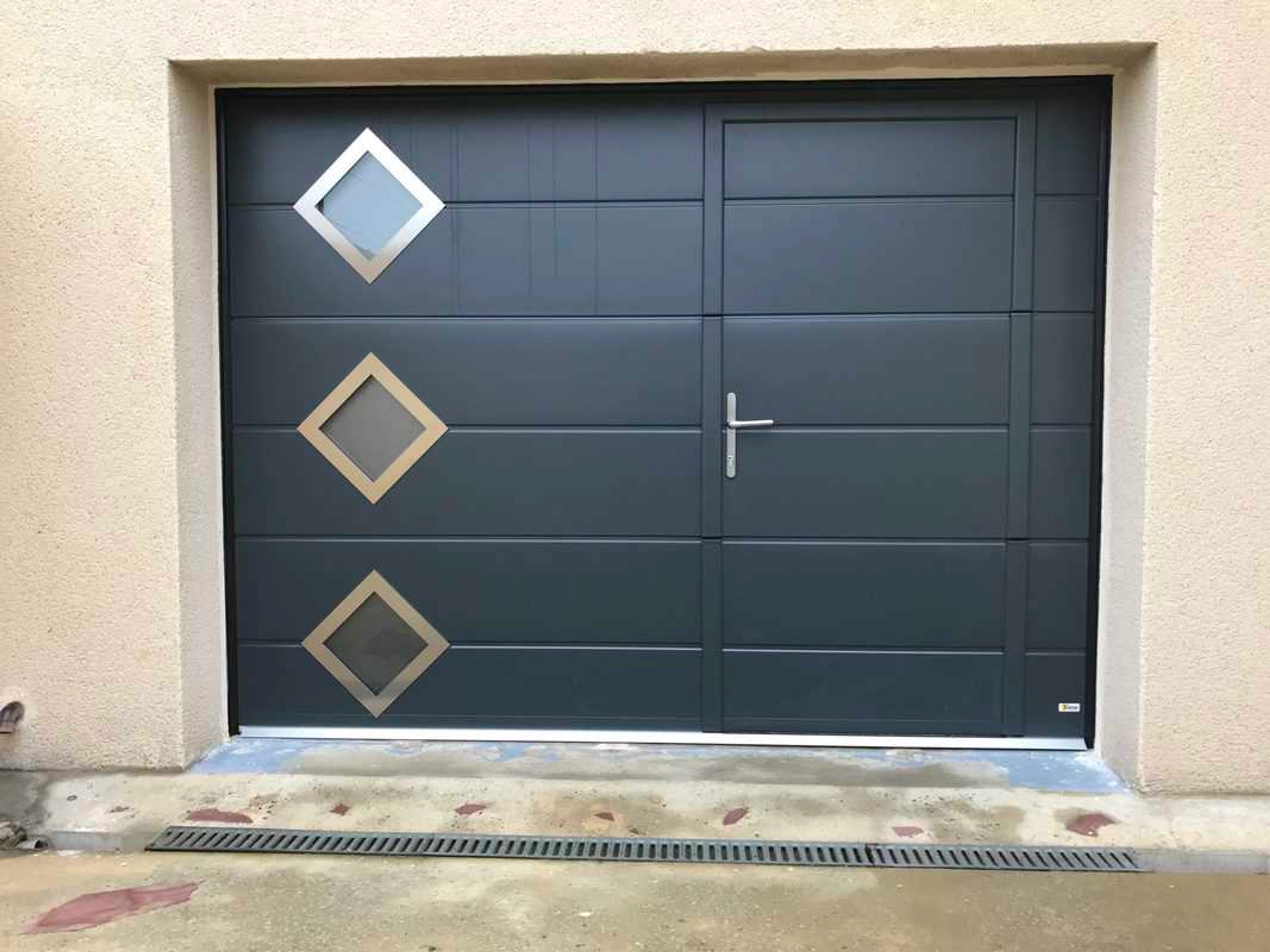 Prix porte de garage sectionnelle avec portillon hörmann