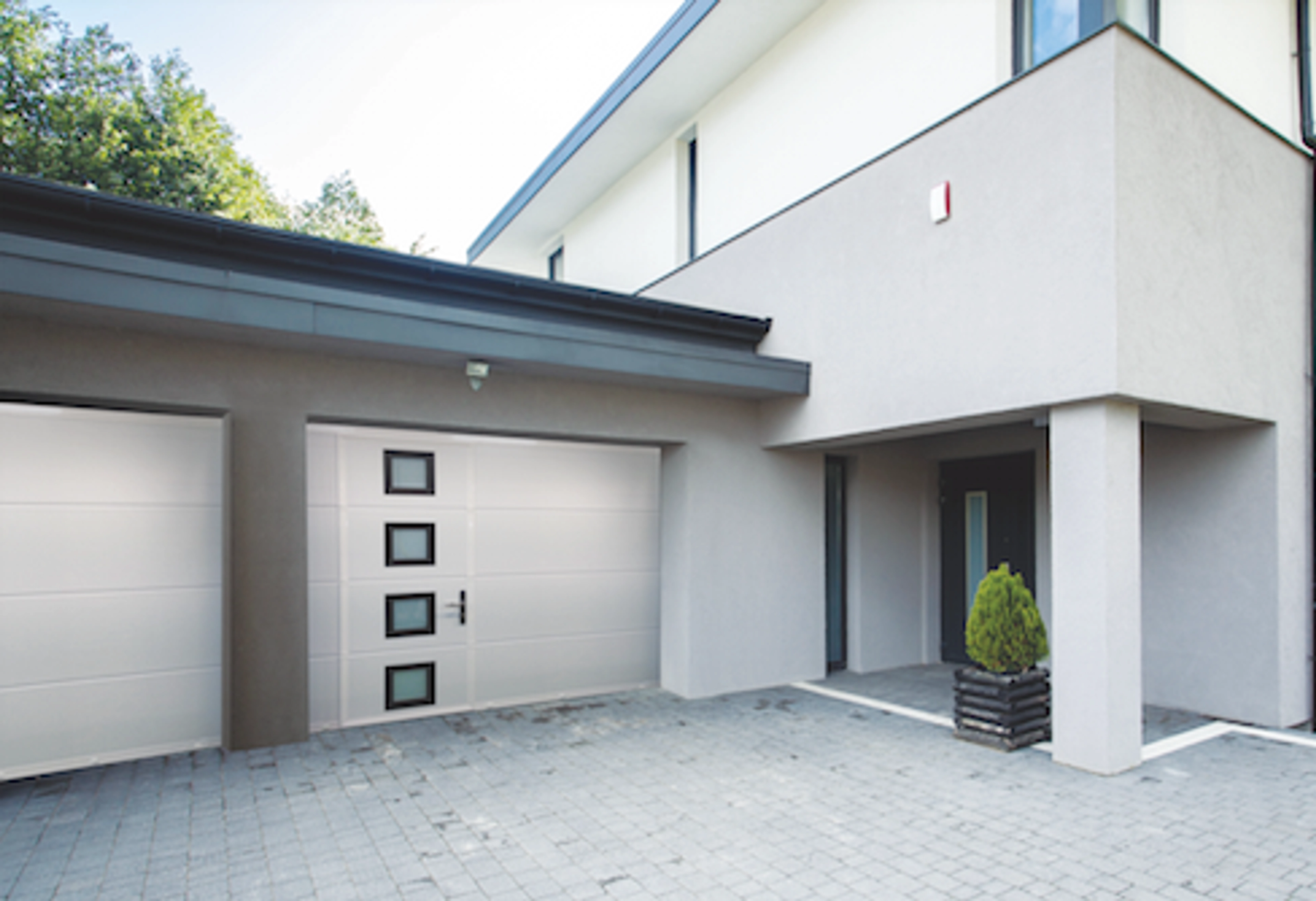 Prix porte de garage sectionnelle avec portillon hörmann